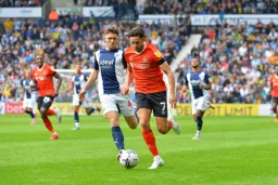 Harry Cornick taking the ball down the line