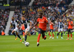 Admiral Muskwe driving forward with the ball