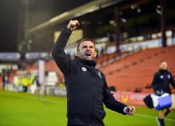 Nathan Jones celebrates with the travelling Hatters
