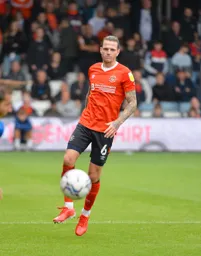 Glen Rea has just played a pass and spots Club Photographer Gareth Owen