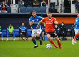 Allan Campbell drives through midfield