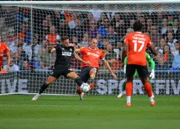 Kal Naismith making a last ditch block