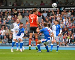 Harry Cornick flicks the ball on