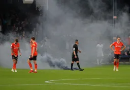 The Swansea turnaround prompted travelling Swans to throw a flare onto the pitch