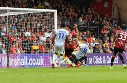 Lloyd Kelly turns a cross into his own net