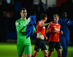 Simon Sluga shows his appreciation to Kenilworth Road