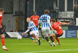 Kal Naismith tries his luck from the edge of the box