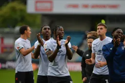 Players celebrating with the crowd