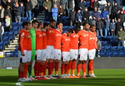 The team lining up ready to play against Preston