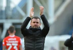 Nathan Jones applauding the travelling Hatters