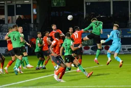 Goalmouth scramble, a lot of Hatters attacking the ball