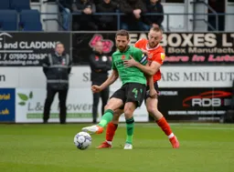 Allan Campbell getting touch tight with Joe Allen