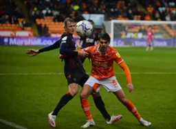 James Bree tangling on the touchline