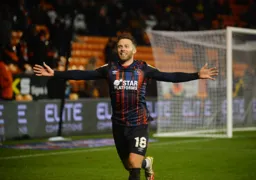 Jordan Clark wheeling away after notching his goal