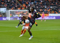 Carlos Mendes-Gomes brings the ball under control by walking like an Egyptian
