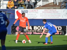 Amari'i Bell trying to progress the ball