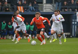 Jordan Clark drives through midfield