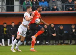 Cameron Jerome battles with Gary Cahill