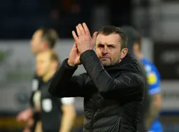 Nathan Jones applauding the fans