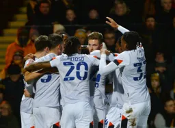 Luton Town players celebrate Reece Burke's opener