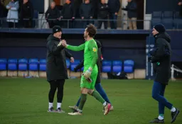 Kevin Pilkington congratulates Jed Steer on his clean sheet
