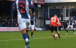 Allan Campbell about to let fly with a long range effort