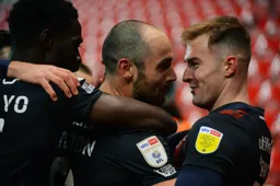 James Bree and Elijah Abebayo show their love for Danny Hylton after he nets for Luton