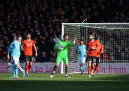 Jed Steer tells everyone to push forward after gathering the ball