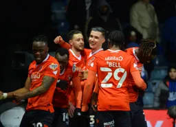 Players celebrate after Cornick's leveller