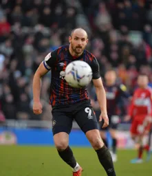 Danny Hylton keeping a close eye on the ball