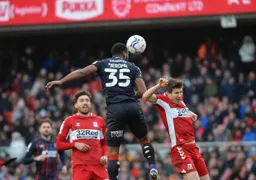 Cameron Jerome heading towards goal