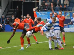 A lot going on here, Tom Lockyer going for the overhead, Reece Burke appealing for a penalty