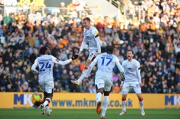 The players celebrate after James Brees' wonderful free kick puts the Town 3-0 up