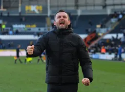Nathan Jones celebrating with the crowd