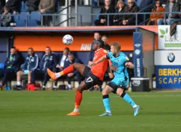 Pelly-Ruddock Mpanzu protecting the ball in midfield