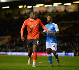 Pelly-Ruddock Mpanzu being man marked
