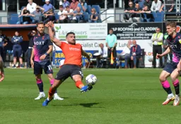 Robert Snodgrass stretching every sinew to keep the ball