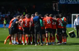 The Town huddle after a vital three points against a playoff contender