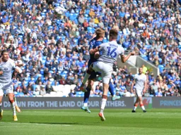Reece Burke competing for the aerial ball