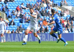 Robert Snodgrass drives forward with the ball