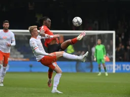 Peter Kioso challenging well for the ball