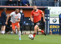 Allan Campbell drives through midfield