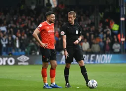 Robert Snodgrass being told where the ball should be placed