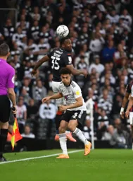 Cameron Jerome flicks the ball on