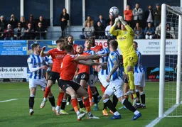 Goalmouth scramble, Keeper Lee Nicholls punches clear