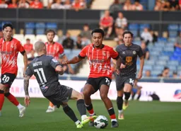 Dion Pereira runs into James Waite