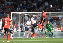 Carlton Morris`s header drifts wide of the goal