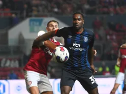 Cameron Jerome shields the ball