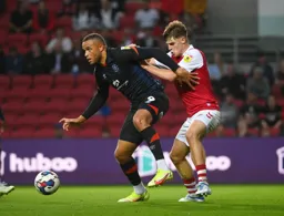 Carlton Morris gets a shove in the back