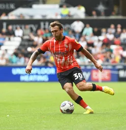 Luke Freeman in possession of the ball